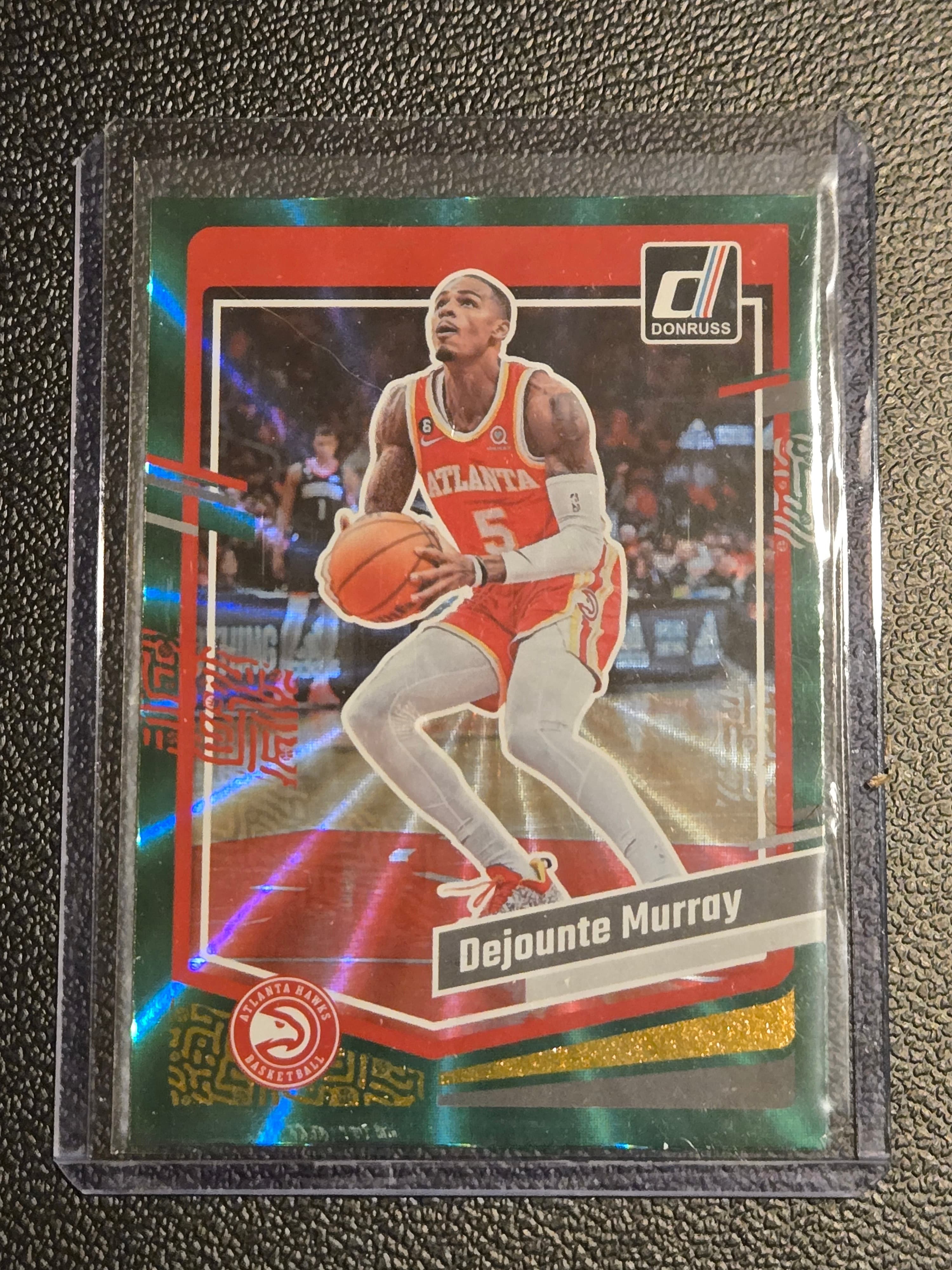 2023-24 Donruss #31 Dejounte Murray Green Laser Holo - Image 1