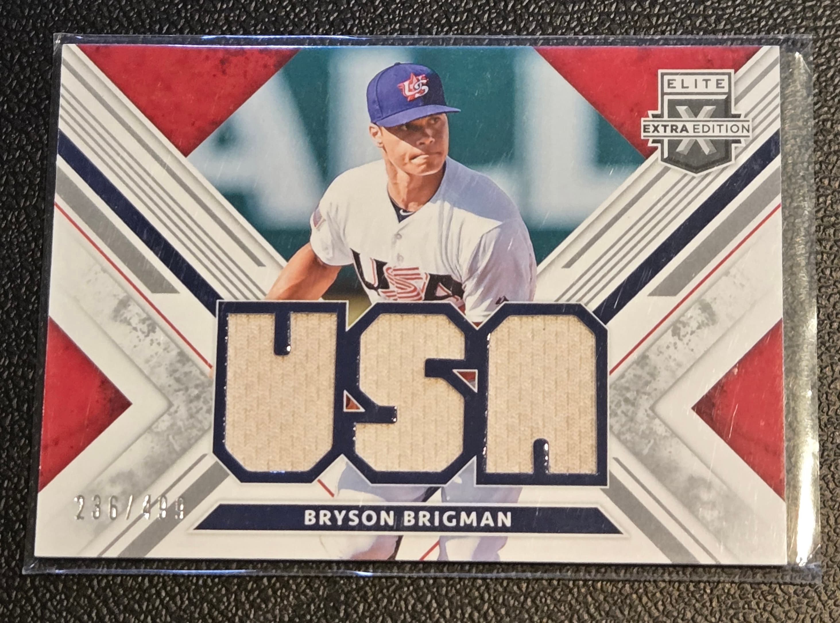2019 Panini Elite Extra Edition #USA-BB Bryson Brigman USA Materials Black #/499 - Image 1
