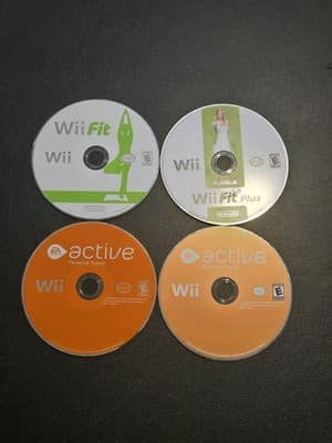Wii Fit / Wii Fit Plus / EA Sports Active lot of 4 games - Image 1