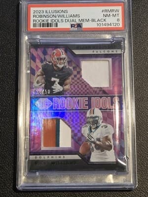 2023 Illusions Bijan Robinson/Ricky Williams Rookie Dual Mem Black #/50 PSA 8 - Image 1