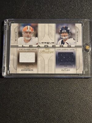 2008 Playoff Prestige Derek Anderson/Jay Cutler MEM, Leaders Materials #/250 - Image 1