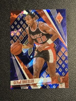 2023-24 Panini Phoenix #240 Clyde Drexler Phoenix Blue Ice - Image 1