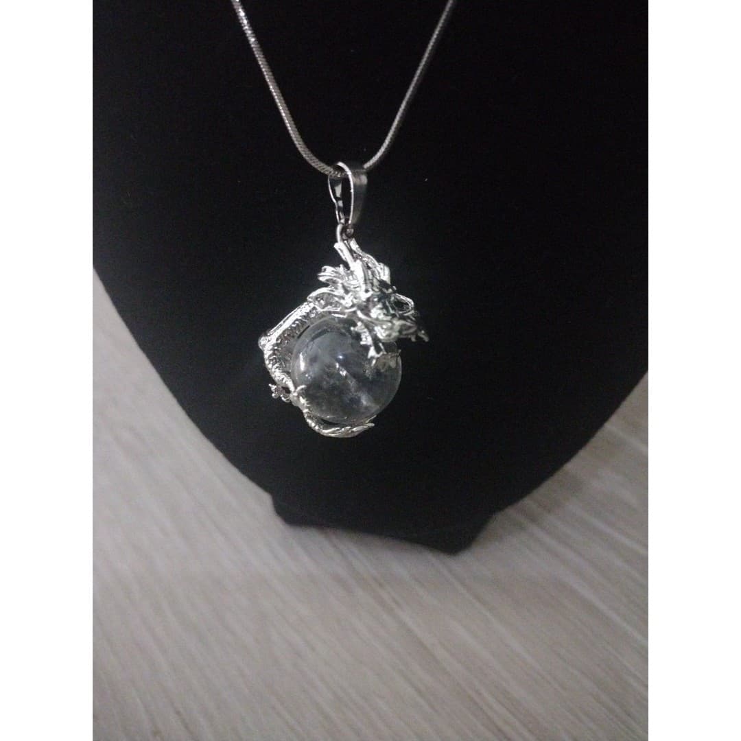 Silver Plated Dragon Wrapped Around A Natural Clear Quartz Gemstone - Image 1