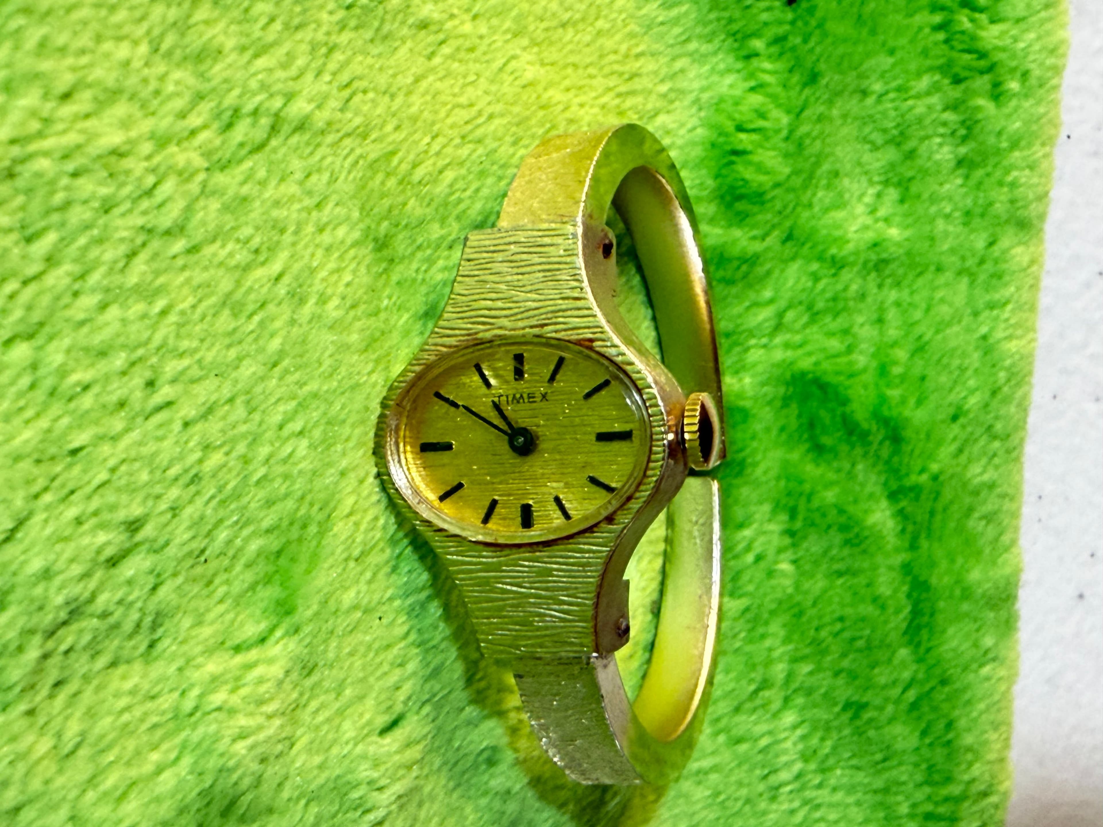 Timex Vintage Gold-Tone Textured Bangle Watch Elegant Design - Image 1