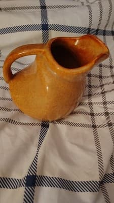 Nilogy Brown Ceramic Glossy Pottery Pitcher with Handle, Round Solid - Image 1