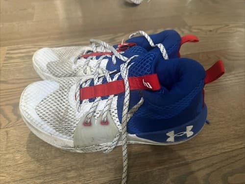 Under Armour Men’s 10.5 Surge Sneakers White And Blue - Image 1
