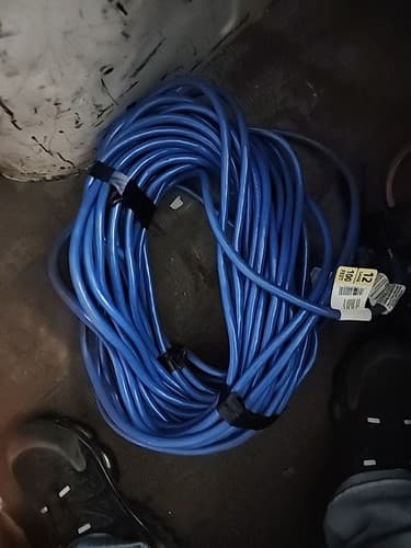Husky 100ft 12/3 Medium Duty Cold Weather Indoor/Outdoor Extension Cord Blue - Image 1