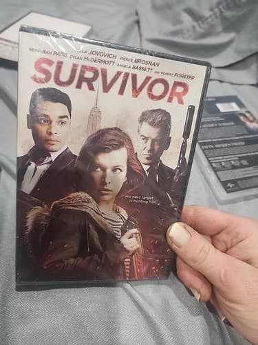 Survivor (DVD, 2021, Brand New) Pierce Brosnan, Milla Jovovich Ships FREE - Image 1