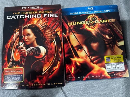 The Hunger Games (Blu-ray) And Catching Fire Both With Slip Covers - Image 1