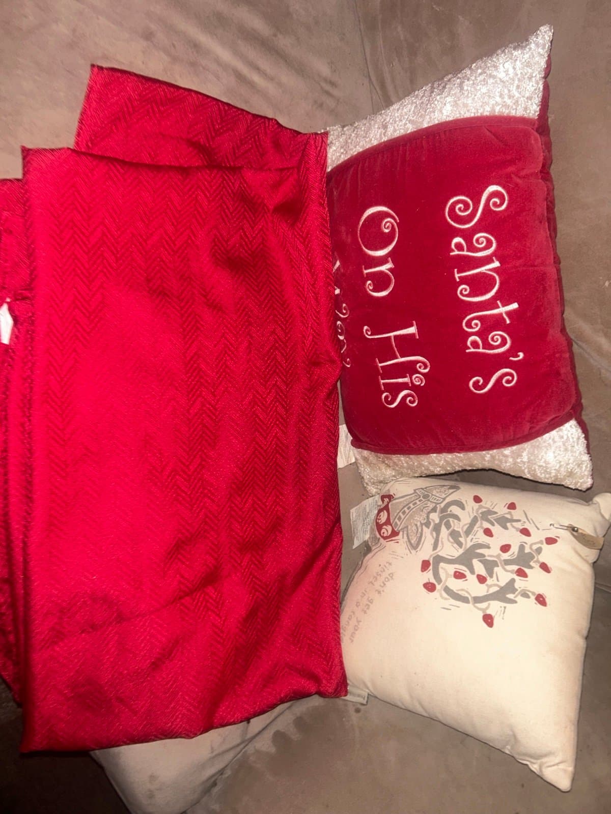 2/- couch pillows and a beautiful, long red tablecloth all brand new