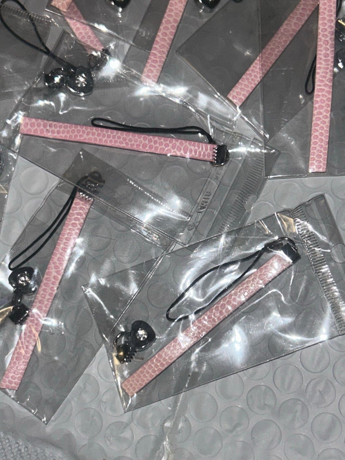 Pink and silver phone accessories one per purchase