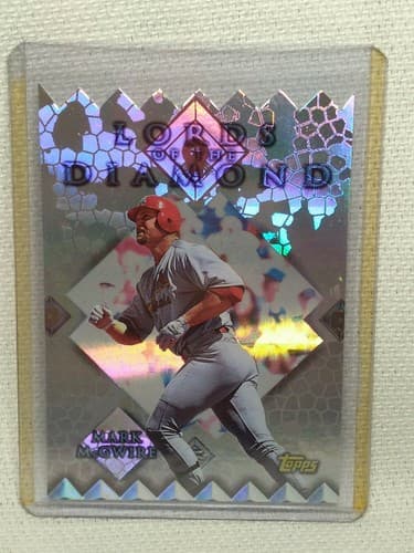 MARK MCGWIRE 1999 TOPPS REFRACTOR BASEBALL CARD Diamond Cut - Image 1