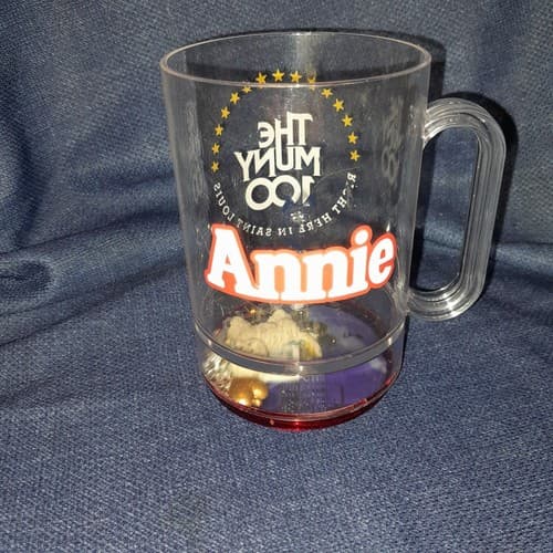 Vtg Annie 100 Yrs Howw Mfg Cup Mug W/Toys Trinket Bottom The Muny Live Theater - Thumbnail 2