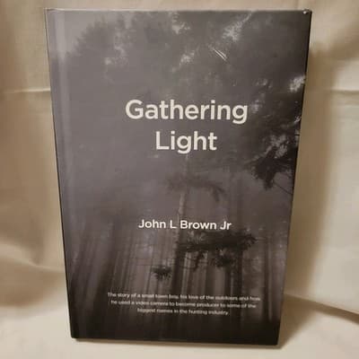 Gathering Light by John L Brown Jr Hardcover 2024 Biography Hunting Outdoors - Image 1