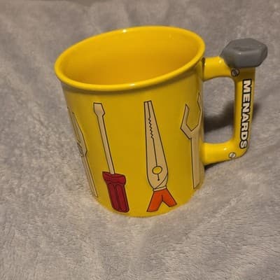 Menards Yellow Advertising Mug with Tool Graphics, Collectible Sign, Coffee Cup - Image 1