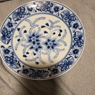 Blue and White Floral Ceramic Collector Plate Round Decorative Pottery - Image 1