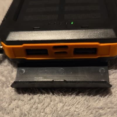 Xeternal Solar Charger Power Bank 20000mAh LED IP68 Compass USB Black/Orange - Thumbnail 3