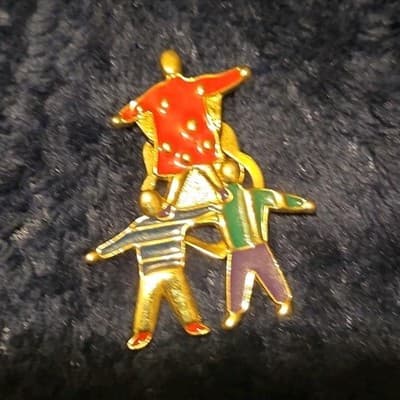 Collectible Pinback Three Children Red, Green, Striped Clothing Design - Image 1