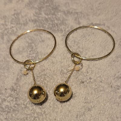 Gold Hoop Earrings with Dangle Ball Accent, Round Metal Design - Image 1