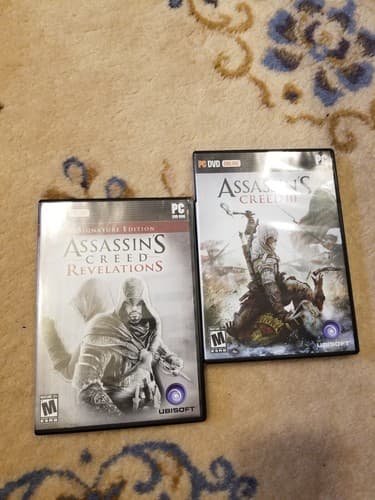 Lot Of 2 ASSASSINS CREED III And REVELATION PC DVD Video Game Set Bundle - Image 1