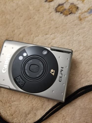 Canon IX 240 ELPH APS Point and Shoot Film Camera Silver Untested For Parts - Thumbnail 3