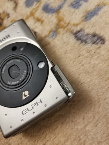 Canon IX 240 ELPH APS Point and Shoot Film Camera Silver Untested For Parts - Thumbnail 5