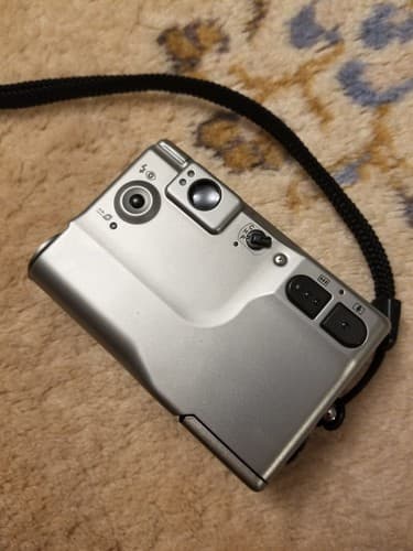 Canon IX 240 ELPH APS Point and Shoot Film Camera Silver Untested For Parts - Thumbnail 6