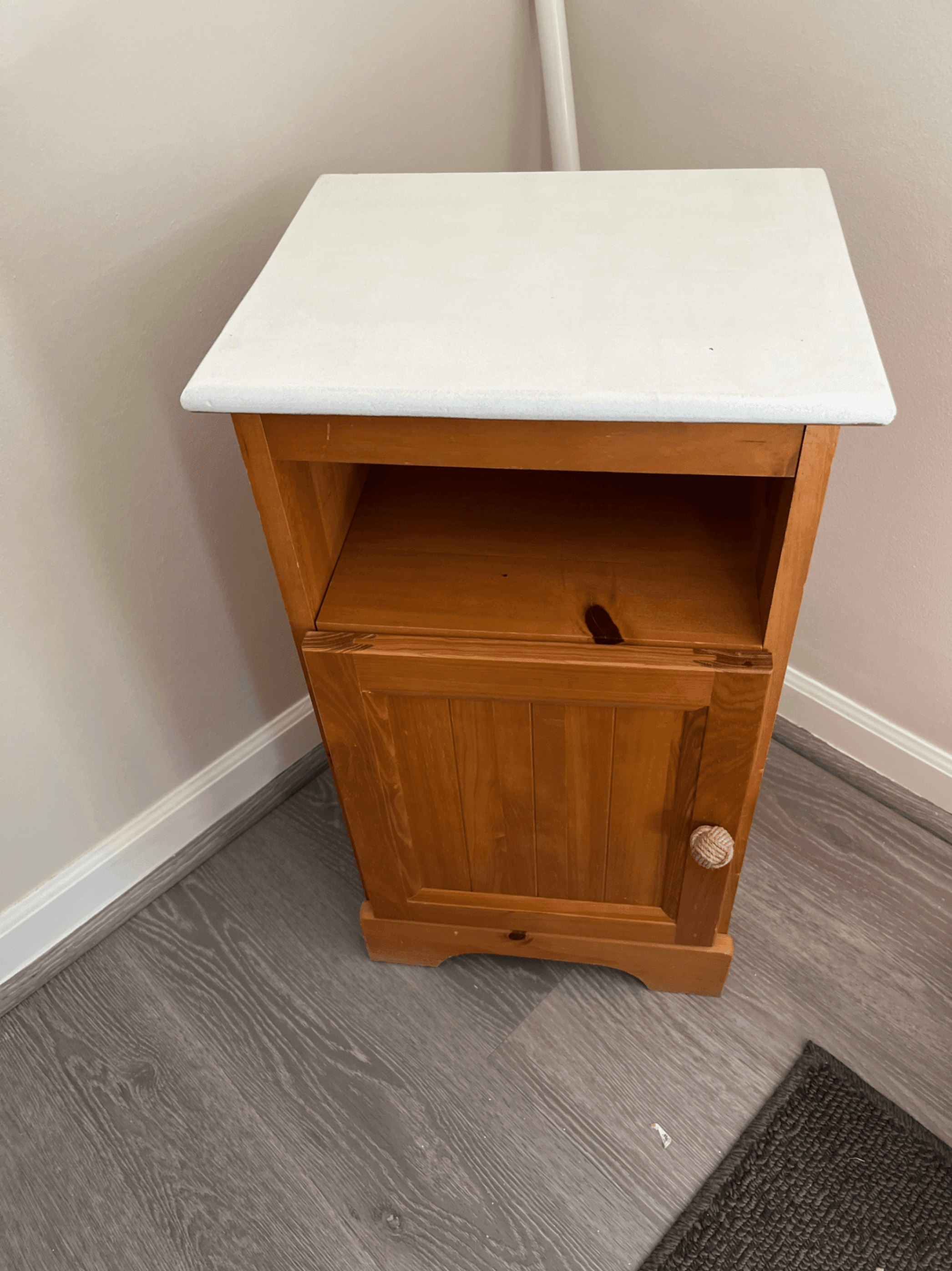 Wooden Nightstand with White Top and Single Door - Image 1
