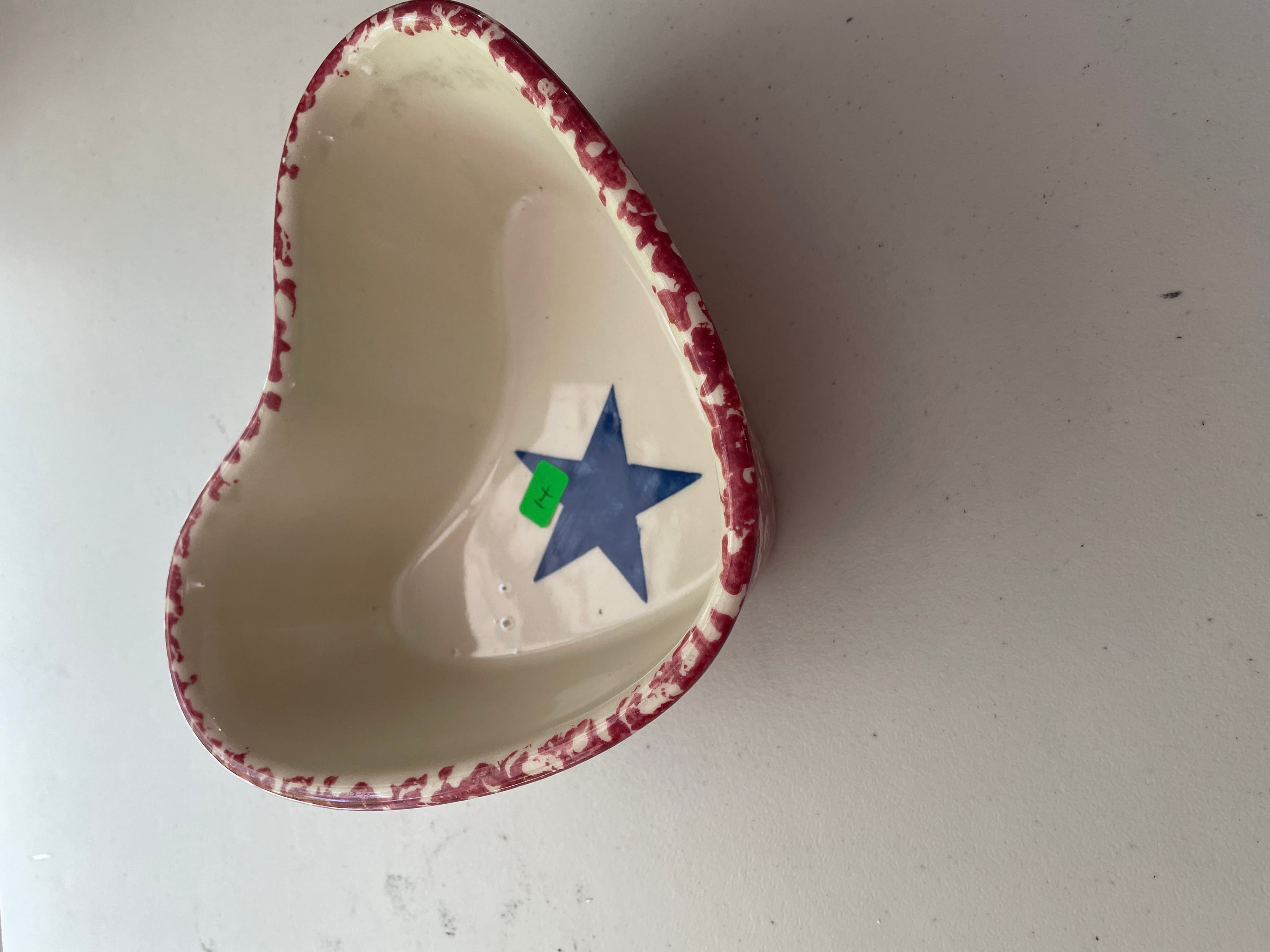 Heart-Shaped Ceramic Bowl with Red Trim and Blue Star - Image 1