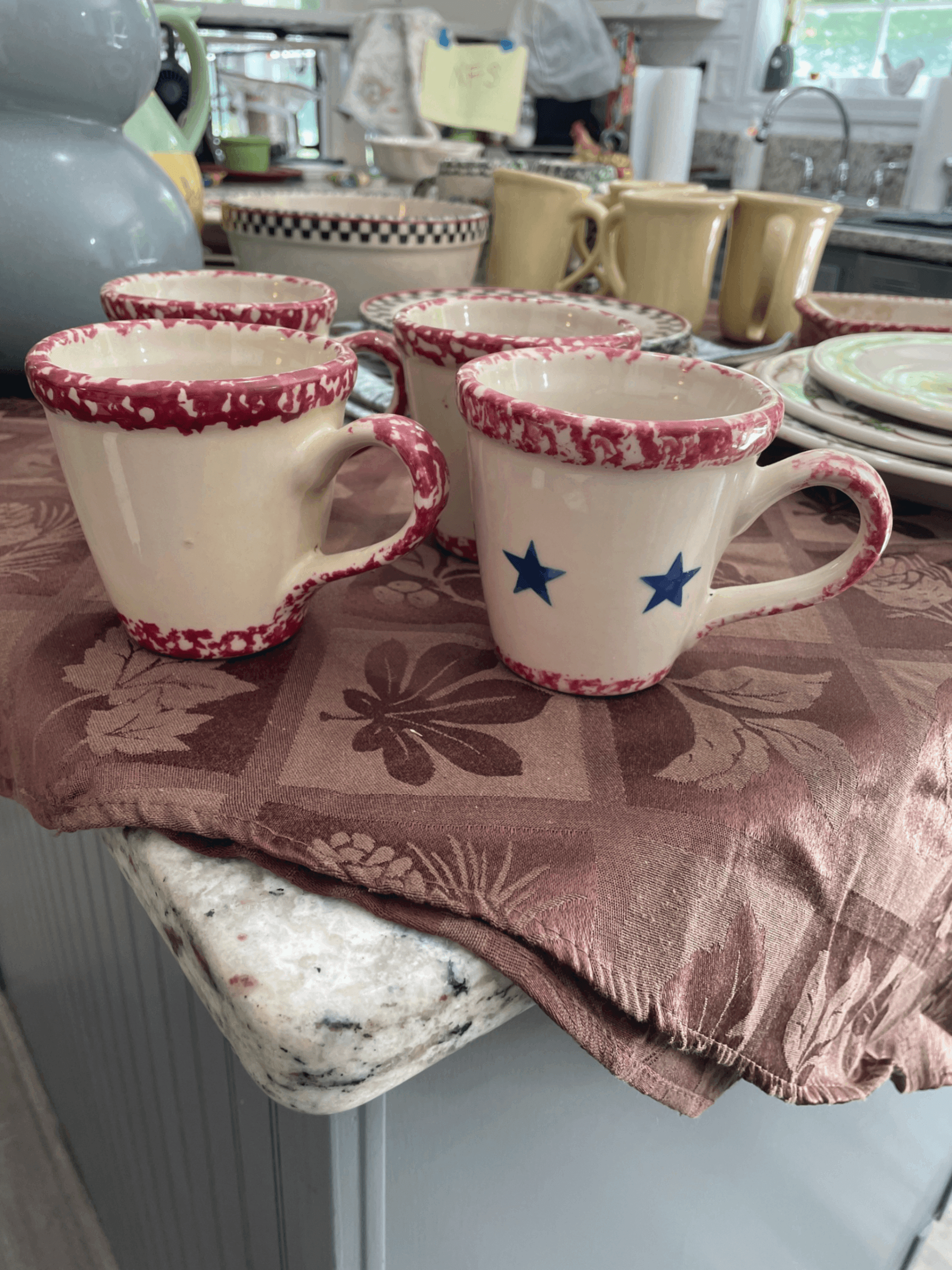 Set of 4 Ceramic Mugs with Red Rim and Blue Star Design - Image 1