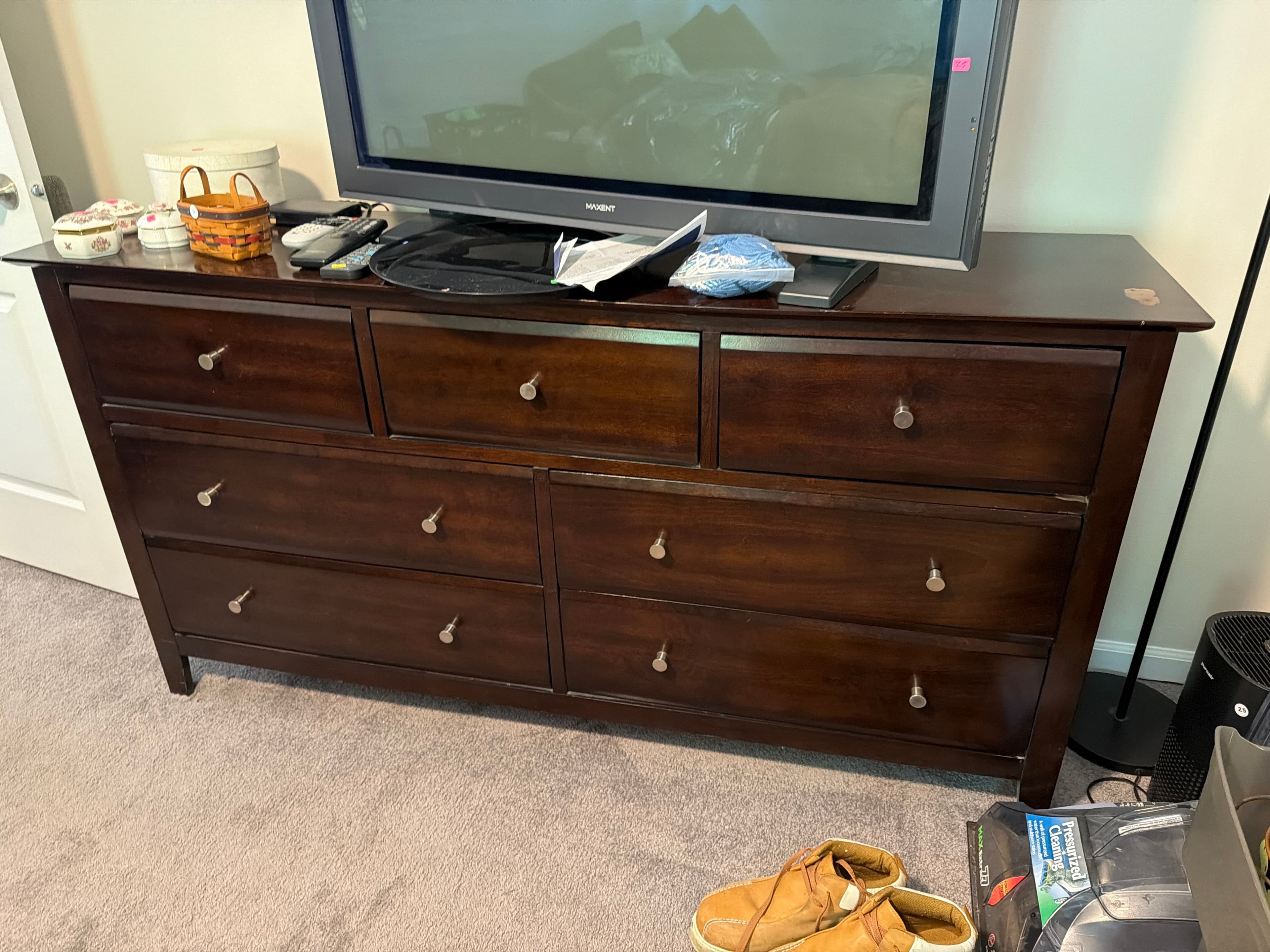 Wooden Dresser with Nine Drawers and Metal Knobs - Image 1