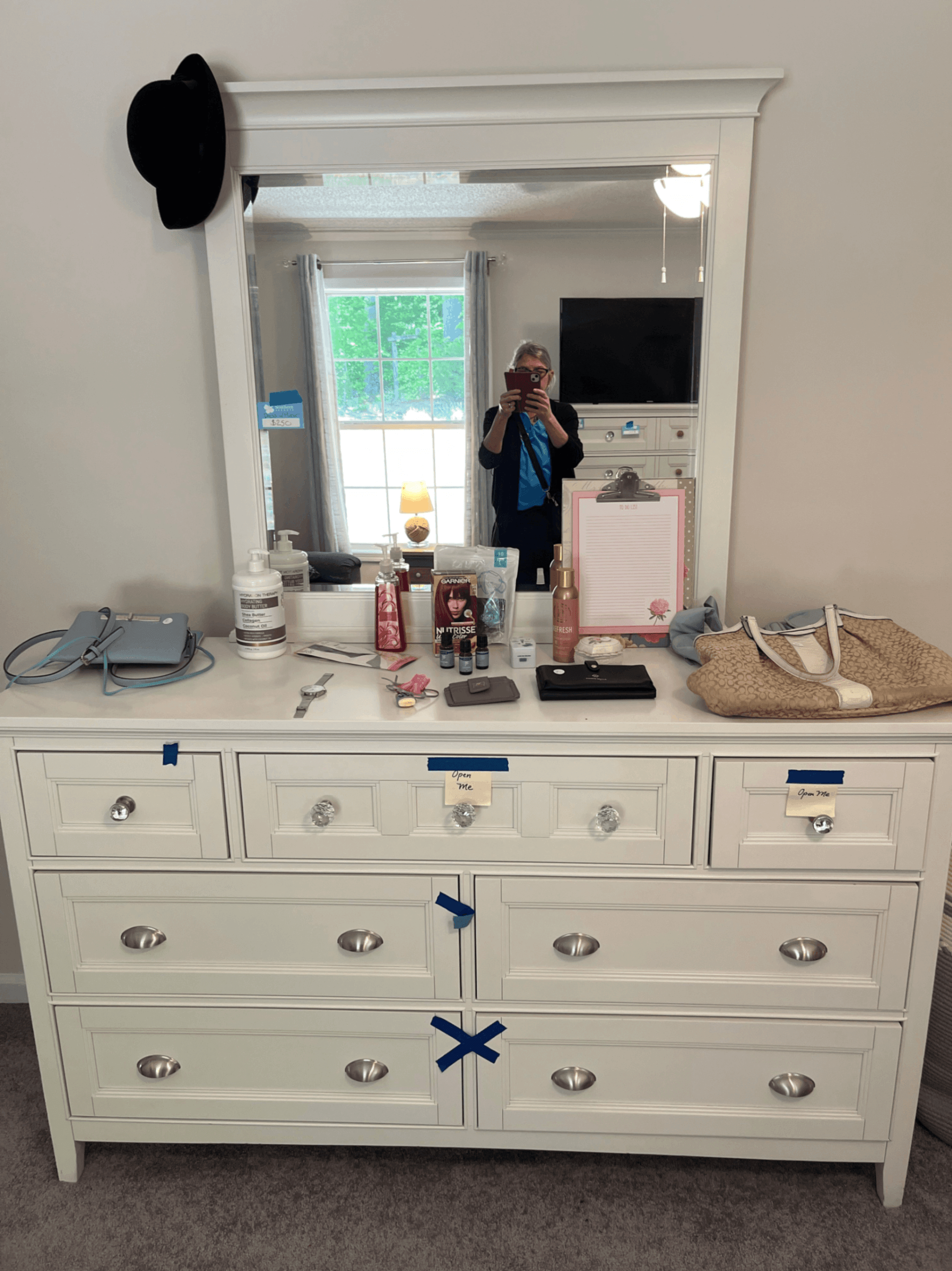 White Dresser with Mirror and Multiple Drawers - Image 1