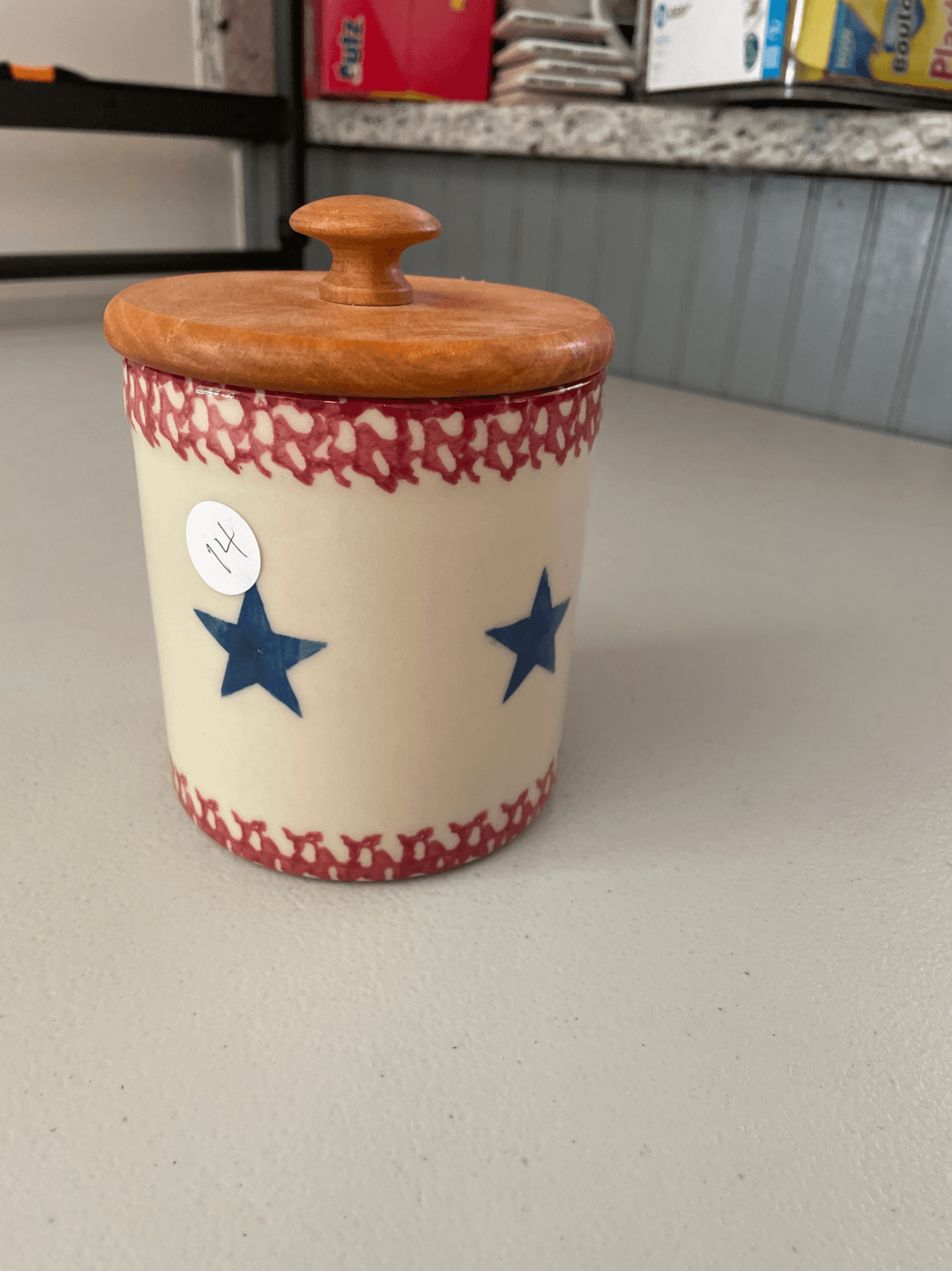 Ceramic Jar with Wooden Lid and Star Design - Image 1