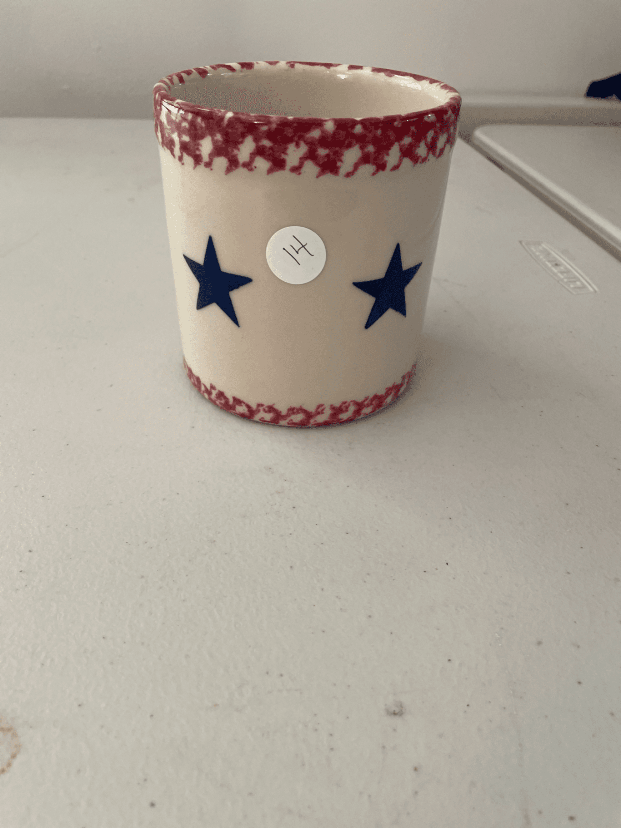 Ceramic Mug with Red Rim and Blue Stars - Image 1