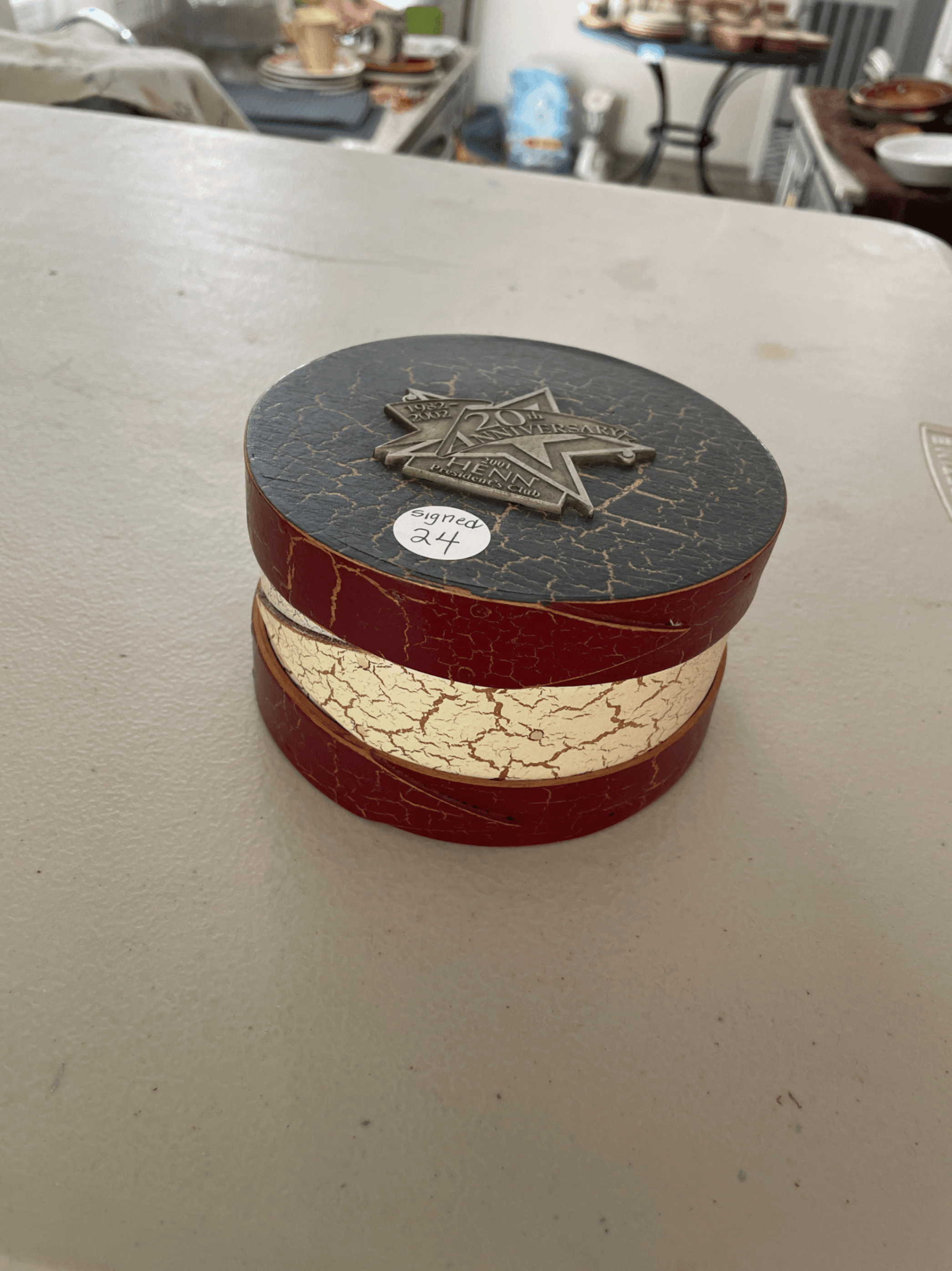 Signed 2002 Round Red Box with Metal Emblem - Image 1