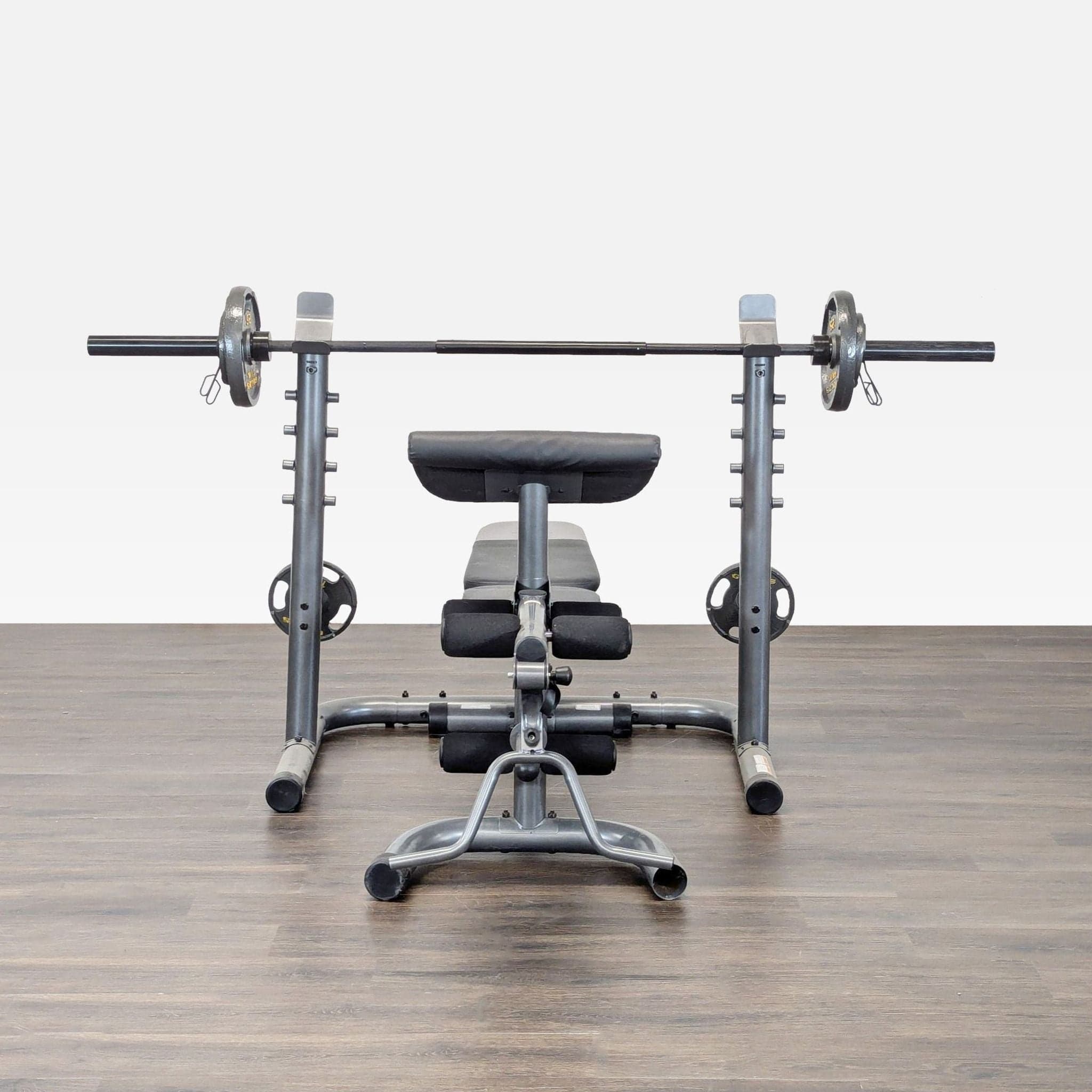 Gold's Gym Adjustable Weight Bench with Barbell and Weights - Image 1