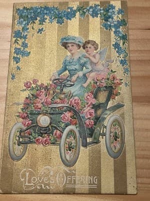 Vintage Embossed Postcard Loves Offering Floral Car Cherub Gold Printed Germany - Image 1