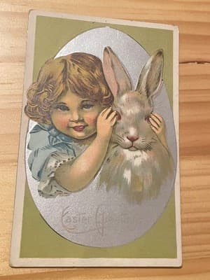 Vintage Embossed Easter Postcard Child with Bunny Made in Saxony Postmarked - Image 1