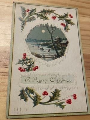 Vintage Embossed Christmas Postcard Skaters Moonlight Holly A Merry Christmas - Image 1