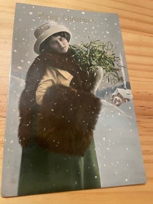 Vintage Merry Christmas Postcard Woman Fur Muff Snowy Scene Handwritten Postmark - Image 1