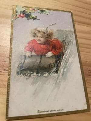 Dennison Christmas Postcard Vintage Child Sledding Gold Border Embossed Unposted - Image 1