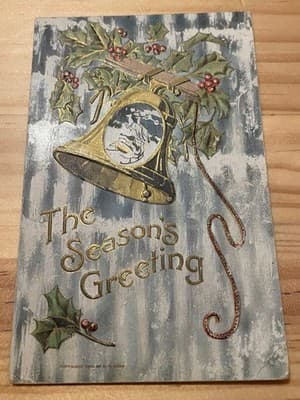 Vintage Embossed Christmas Postcard The Seasons Greeting Bell Gold Trim Mailed - Image 1