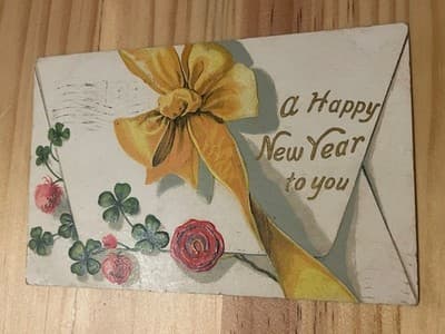 Vintage A Happy New Year Postcard Embossed Yellow Bow Clover Strawberries Used - Image 1