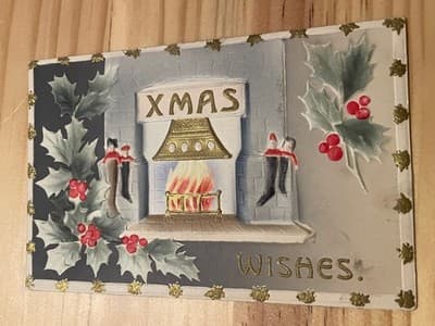 Vintage Embossed Christmas Postcard XMAS Wishes Fireplace Holly 2c Stamp Stamped - Image 1