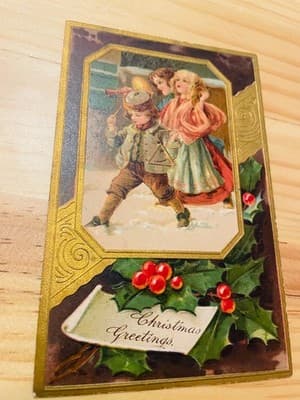 Vintage Embossed Christmas Postcard Printed in Germany Holly Children Snow Gold - Image 1
