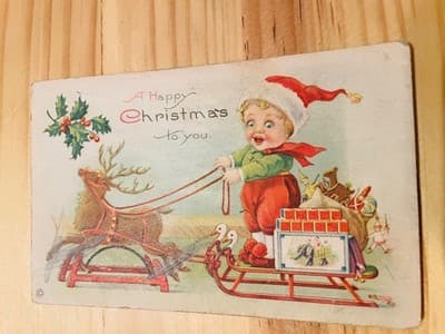 Vintage Christmas Postcard Child Santa Hat Sleigh Reindeer A Happy Christmas - Image 1