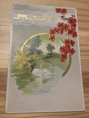 Vintage Embossed Postcard Swans Lake Gold Foil Red Flowers Postmarked Used - Image 1