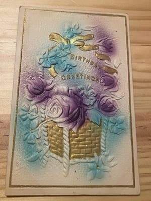 Embossed Birthday Greetings Postcard Floral Basket Hand Tinted Purple Blue Gold - Image 1