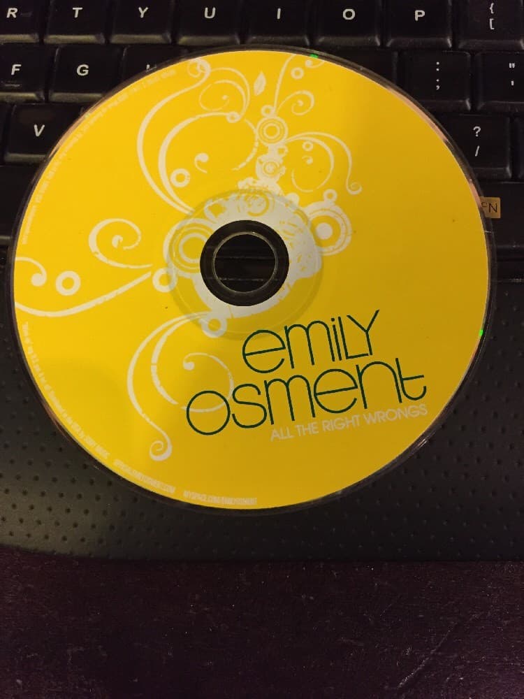 Emily Osment : All the Right Wrongs CD - Image 1