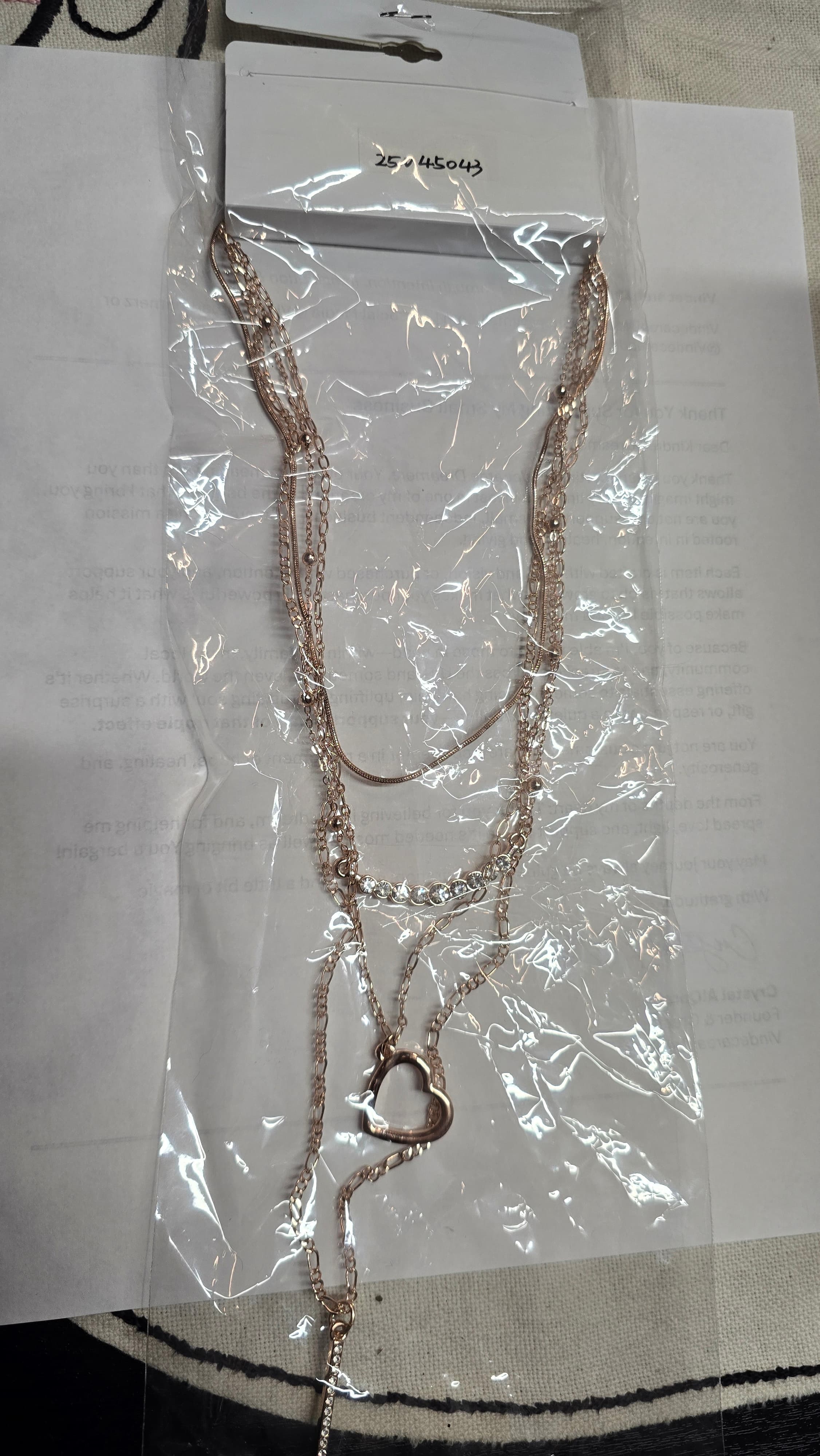 Layered Heart Pendant Necklace with Crystal Accents - Image 1